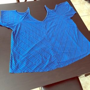 Torid cold shoulder tunic size 4. Very flattering